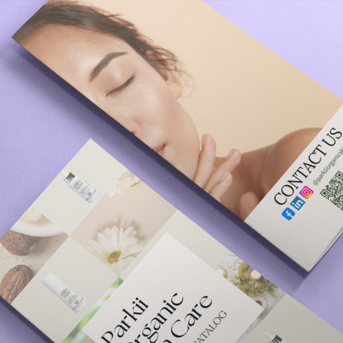 Two of Parkii Organic Skin Care brochures featuring a serene woman with closed eyes on the cover.